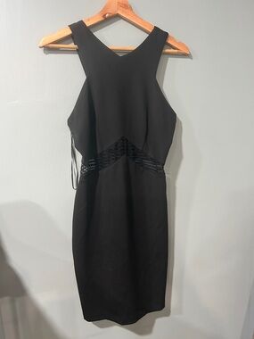 Black Sleeveless Mini Dress with Lace Waist Detail